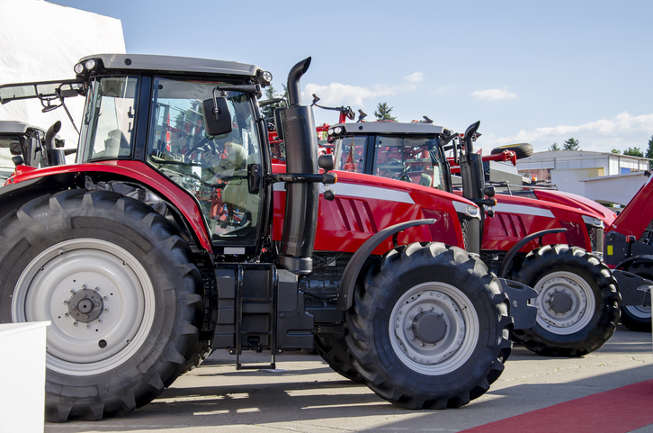 Red large tractor, machine for sowing, preparation and cultivation of soil for farmers